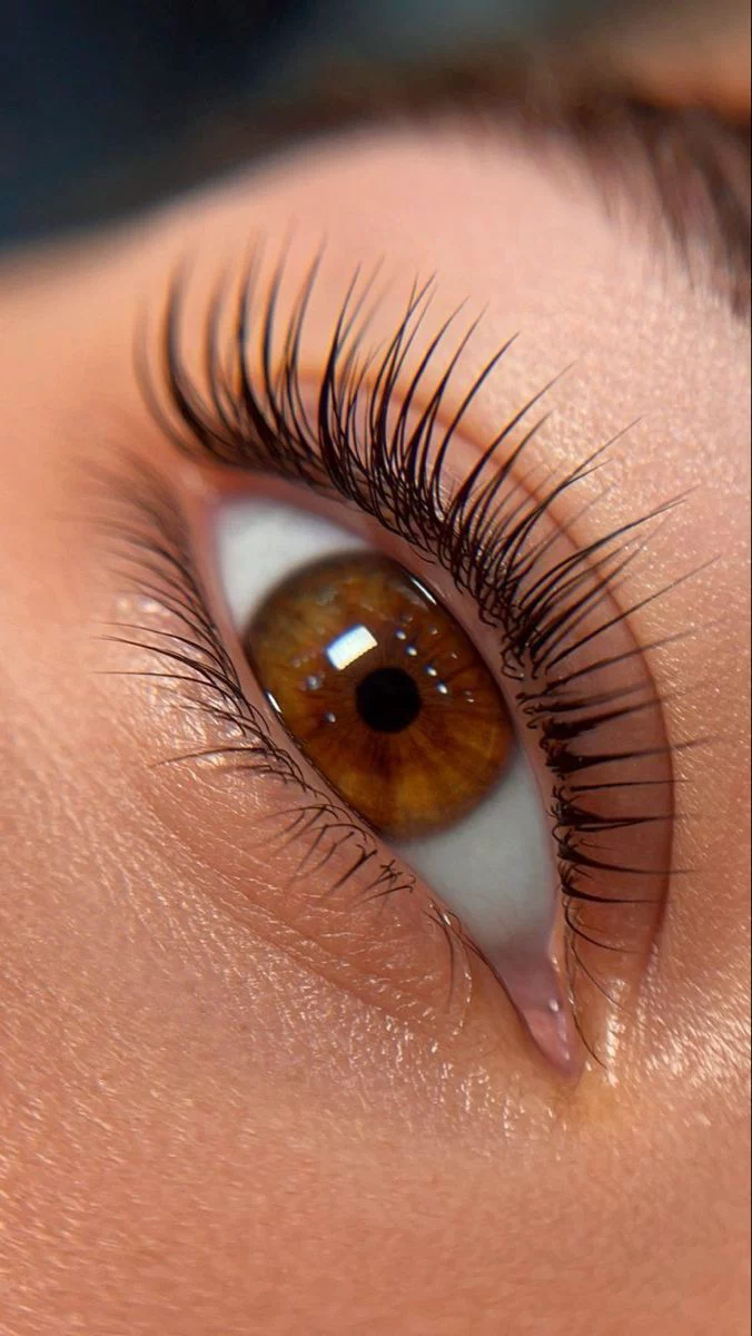 Elegant woman showcasing Classic Natural Look lashes